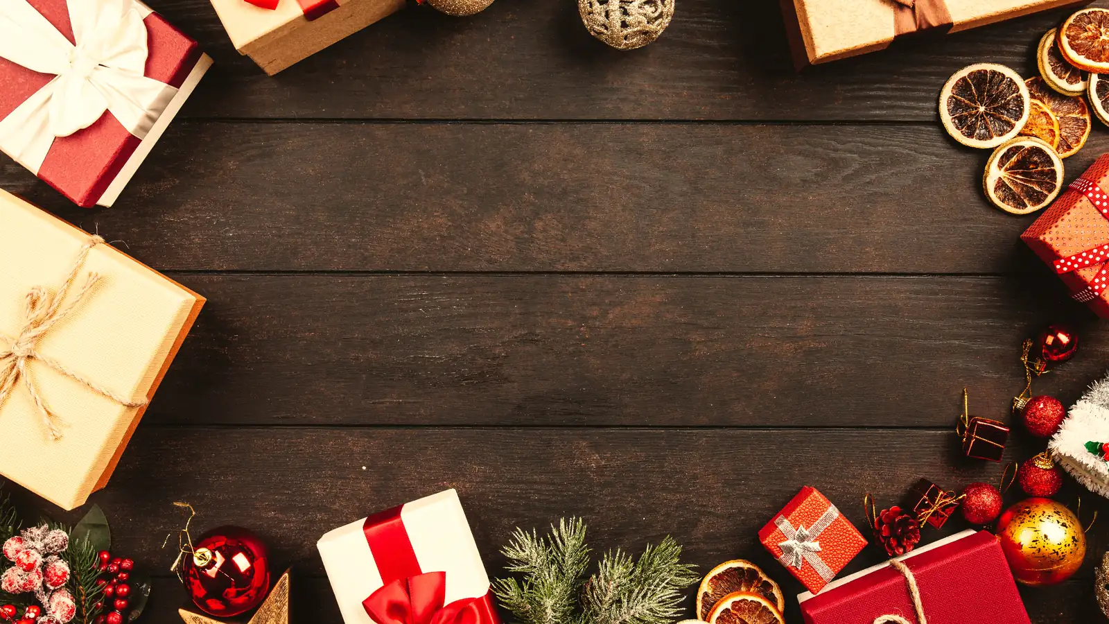 Wrapped gift boxes on a wooden table