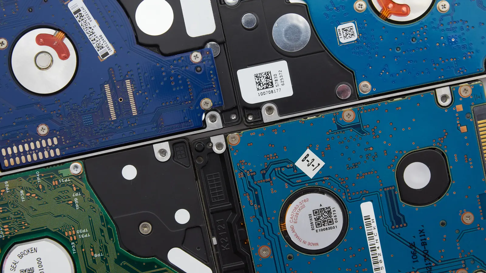 Several hard drives laid side by side